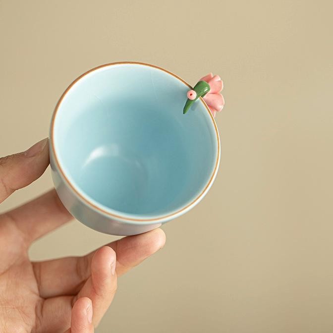 Sky Blue Blossom Ceramic Tea Cup - Image 4